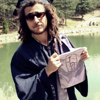 Mehmet Çetin'in Hacettepe Üniversitesi Psikoloji Bölümü mezuniyet törenine ait fotoğrafı